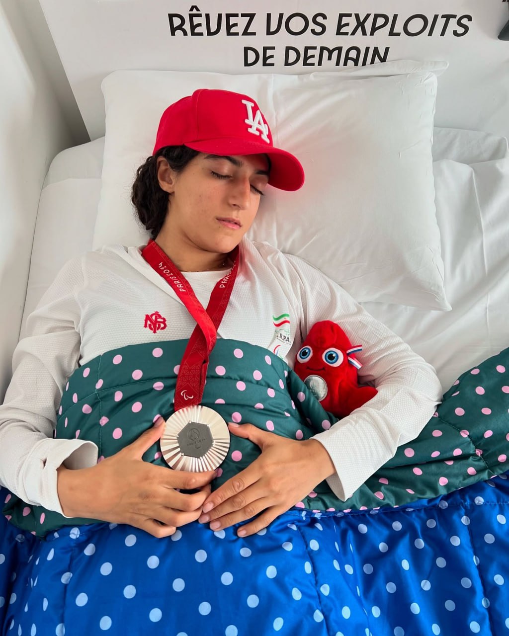 تصاویر هاجر صفرزاده قهرمان پارامپیک دو و میدانی 8